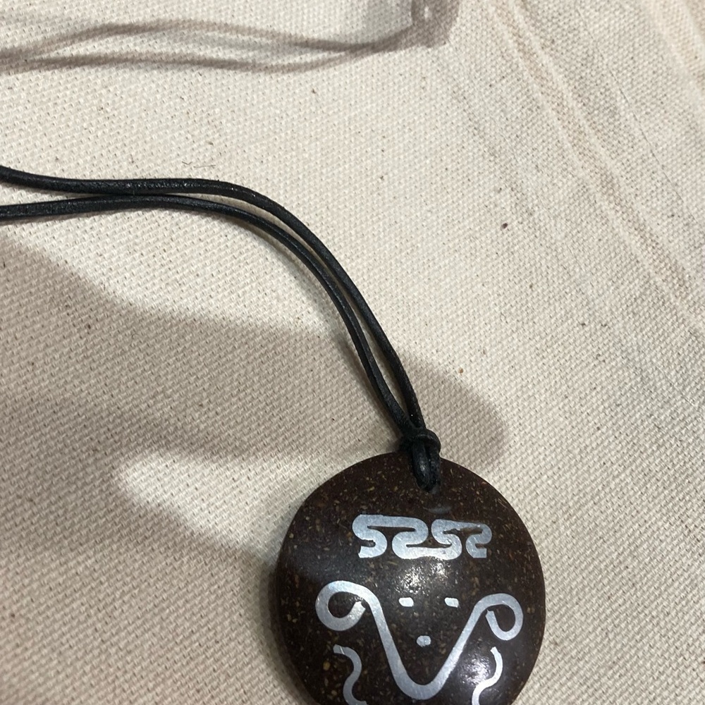 Round Brown Coconut Shell Pendant Necklace with White Tribal Design